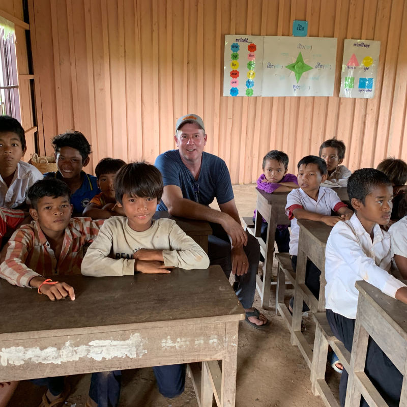 Kids in classroom looking at camera