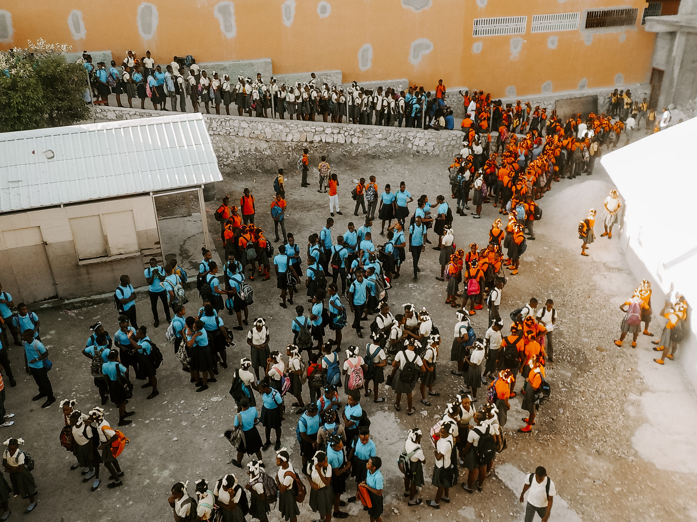 Photo of a Crowd of Students at a school yard Photo of a Crowd of Students at a school yard