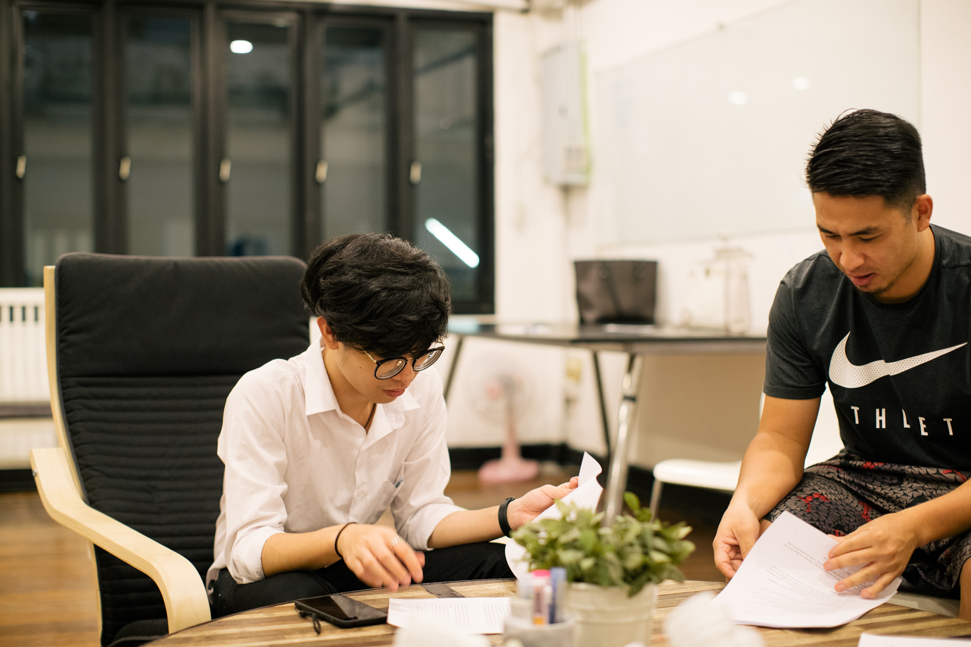 Photo of two young adults studying by Imagine Thailand