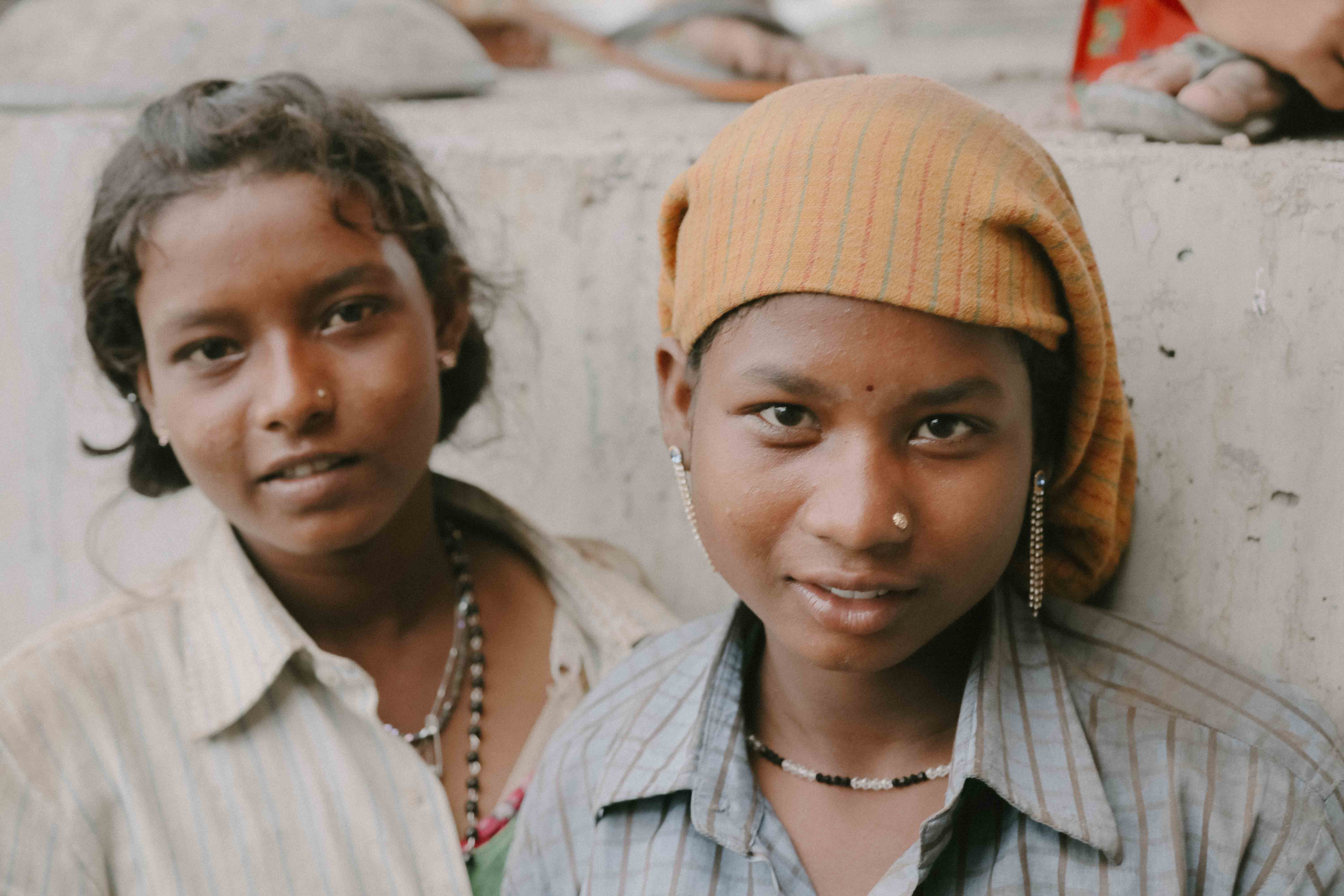 Photo of two girls looking at the camera.