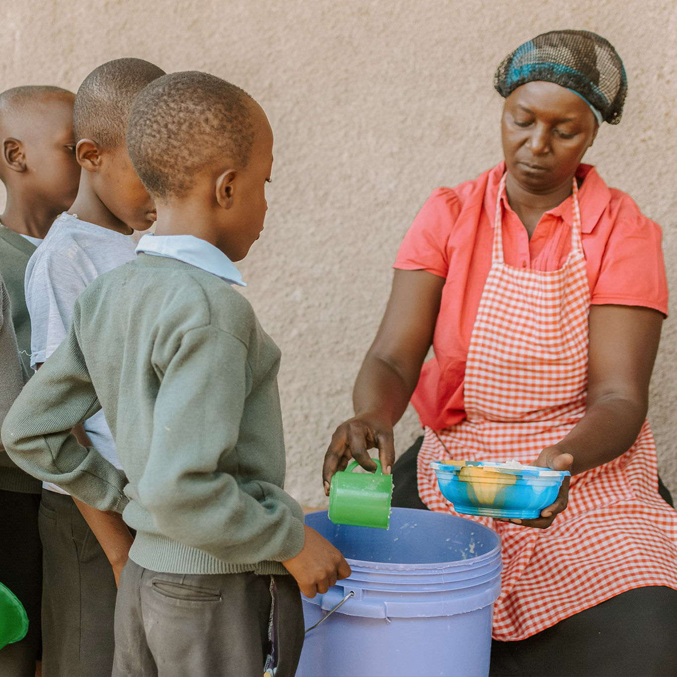 Photo of ChildCARE Plus kids receiving food for lunch