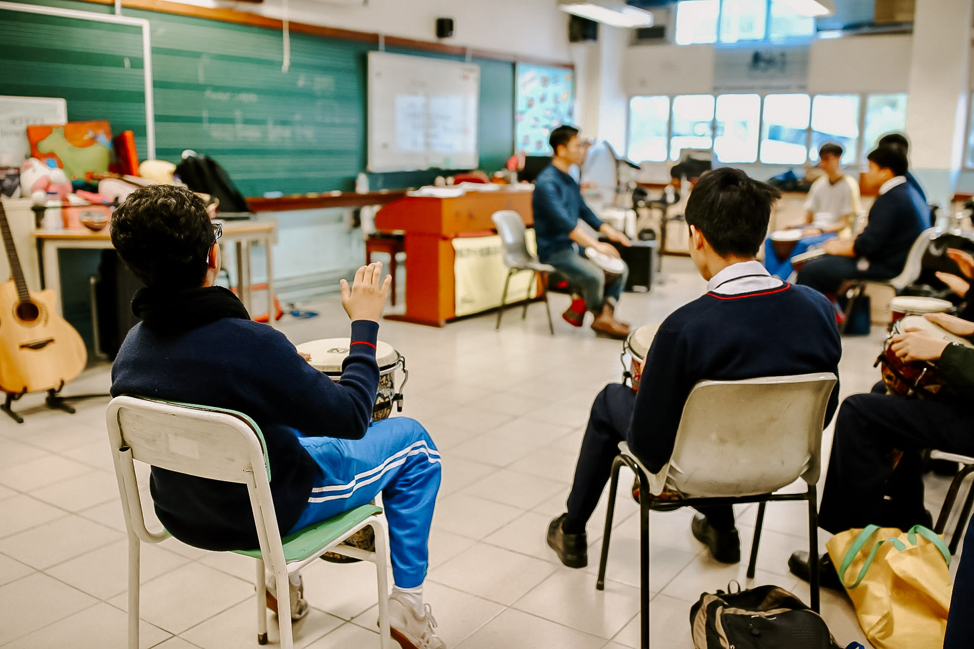 Photo of a group of students in a music class in Hong Kong