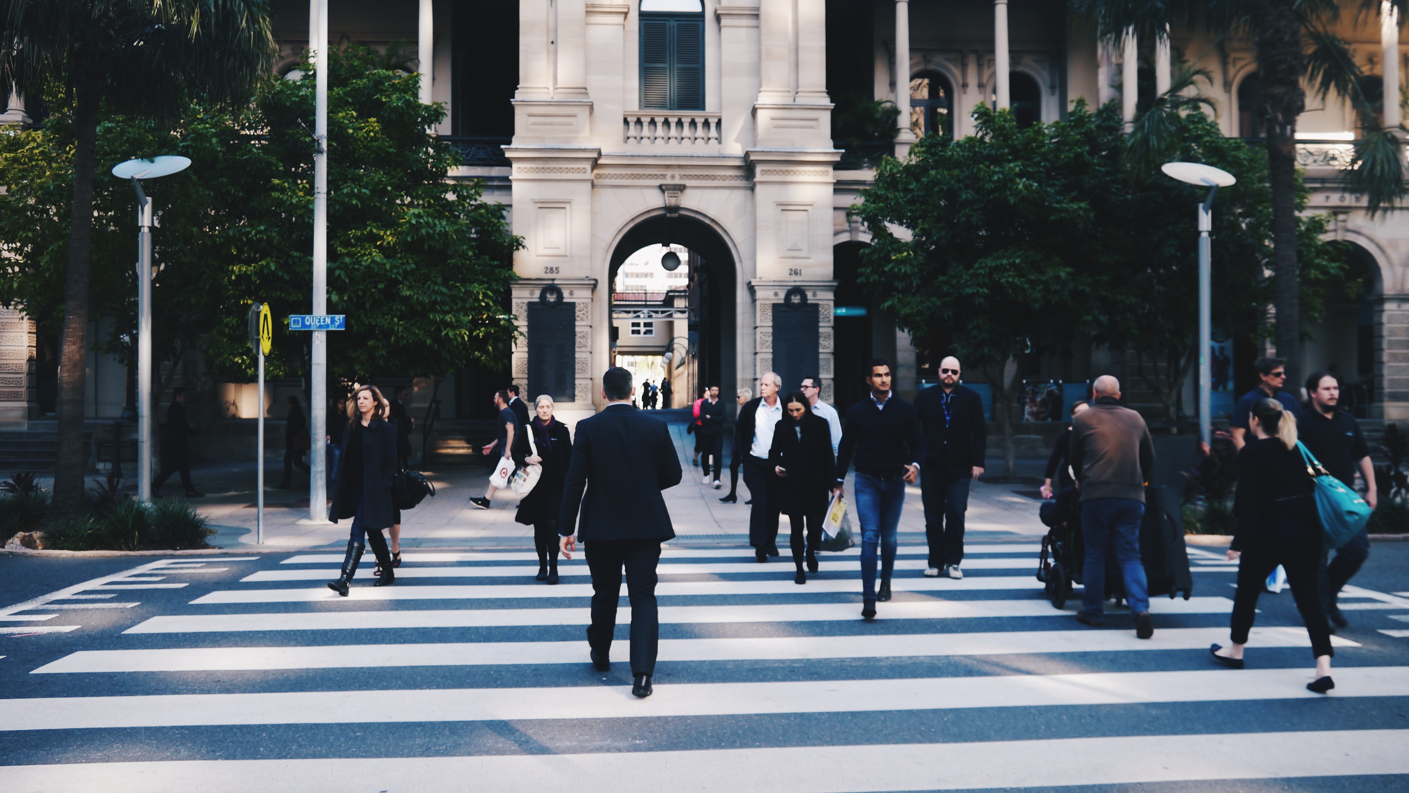 Photo of a crowd in the streets of Thailand by Shawn Pang on Unsplash.