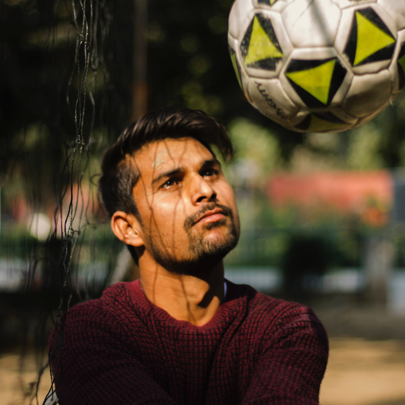 Photo of a man playing volleyball