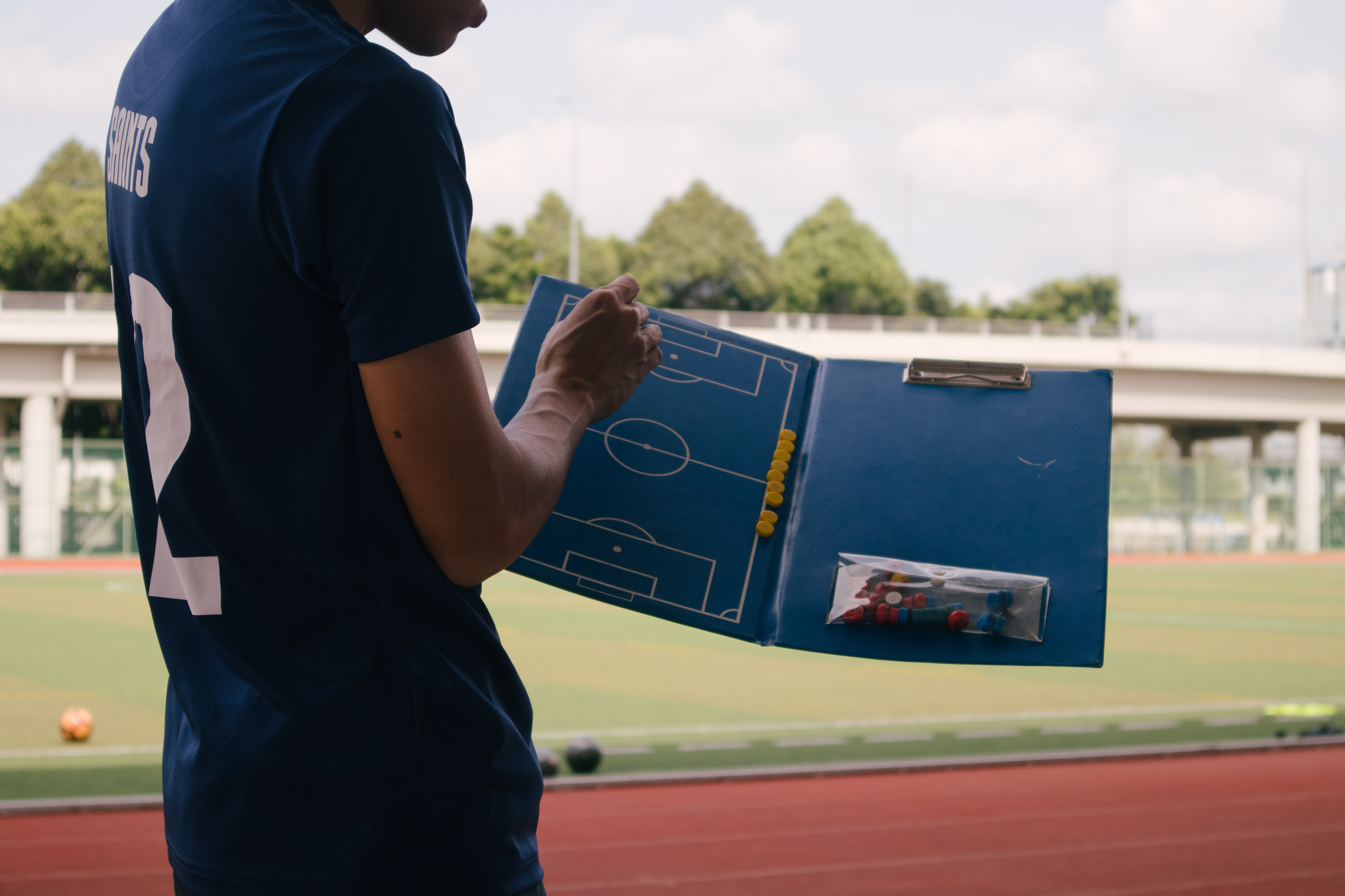 Photo of a coach showcasing a plan by Nguyen Thu on Unsplash