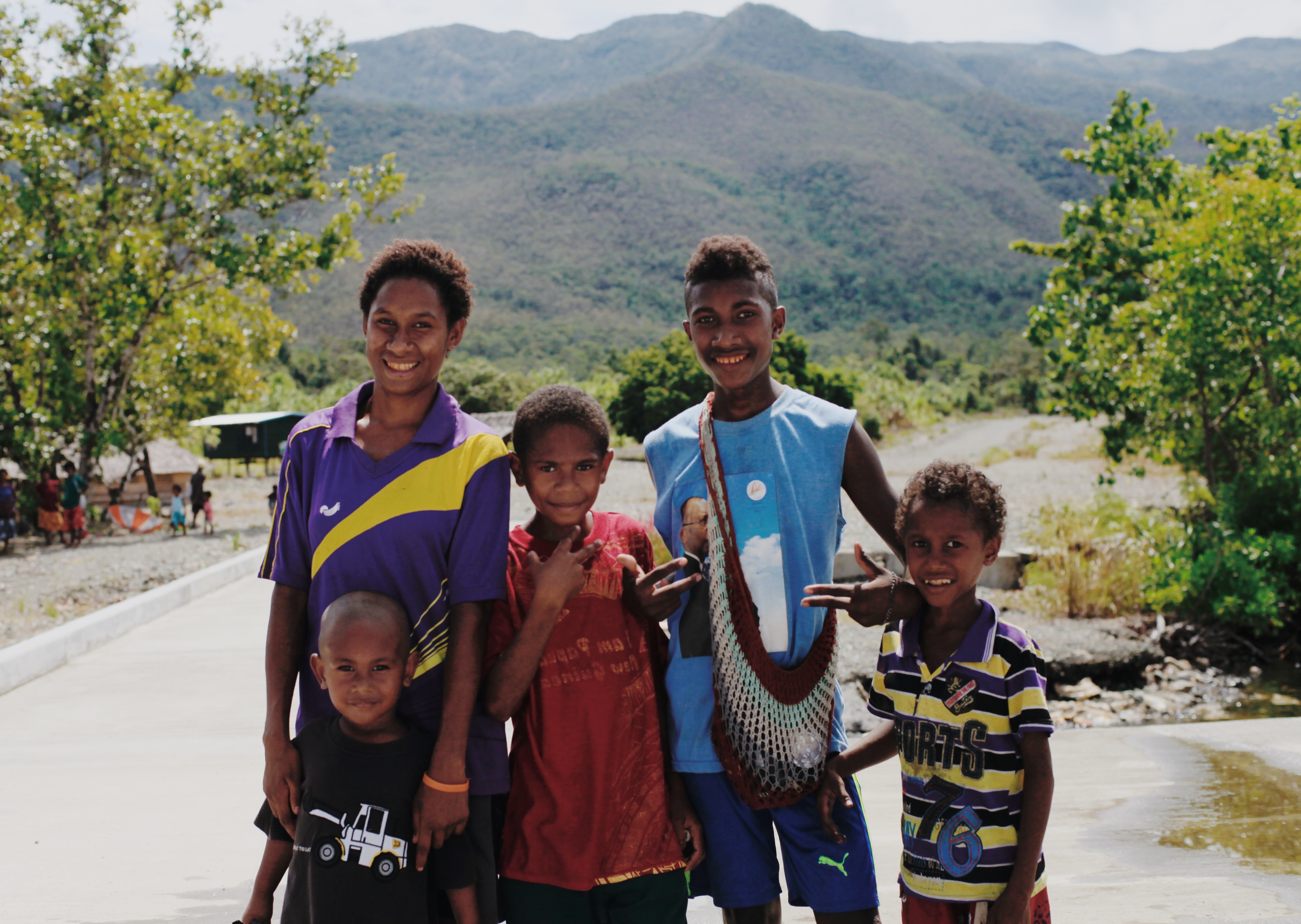 Photo of a group of students in Guinea by Vika Chartier on Unsplash.