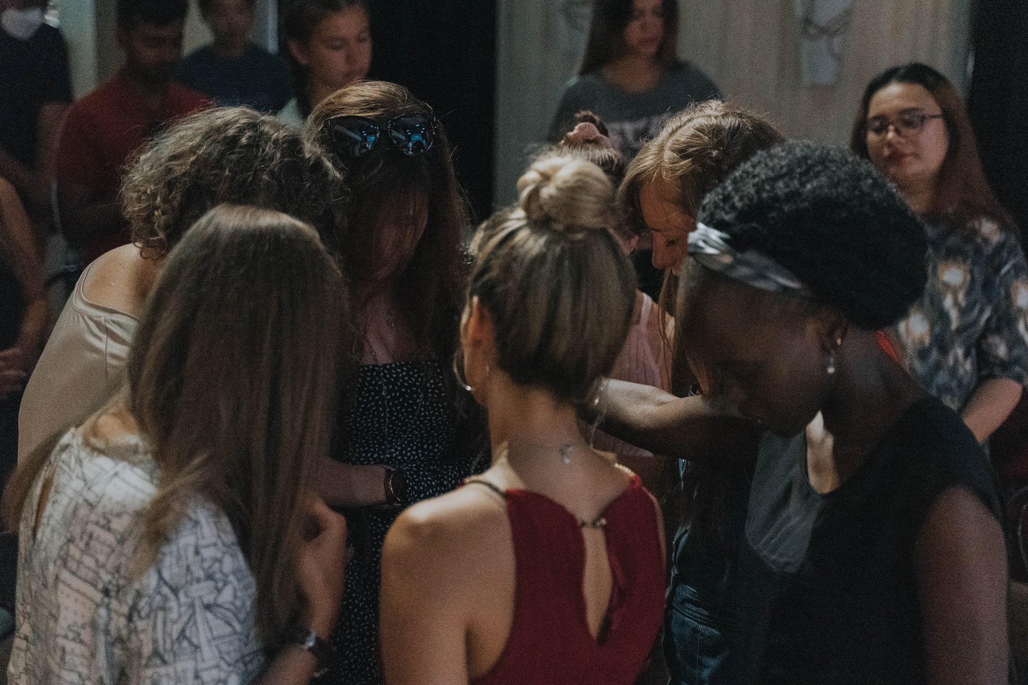 Photo of a group of students praying from Equippers Church in Budapest.