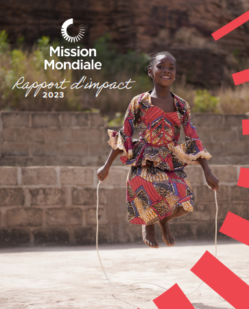 Young girl jumping rope smiling