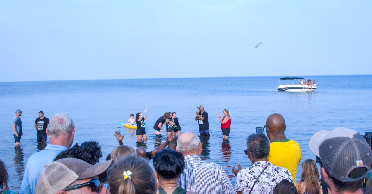 People watching people get baptized at Church on the Beach.