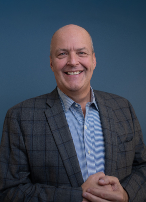 A headshot of Craig Burton