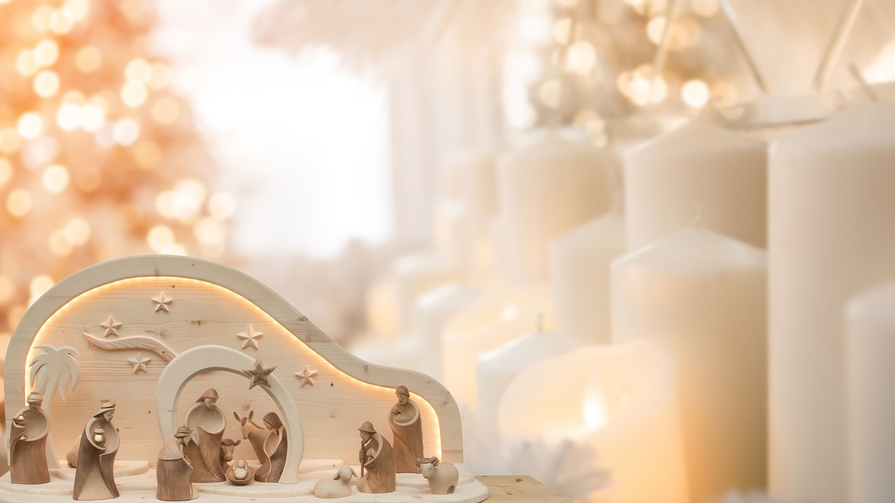 Stock image of a Nativity scene made of wooden figures, with the words "Join Us For" displayed