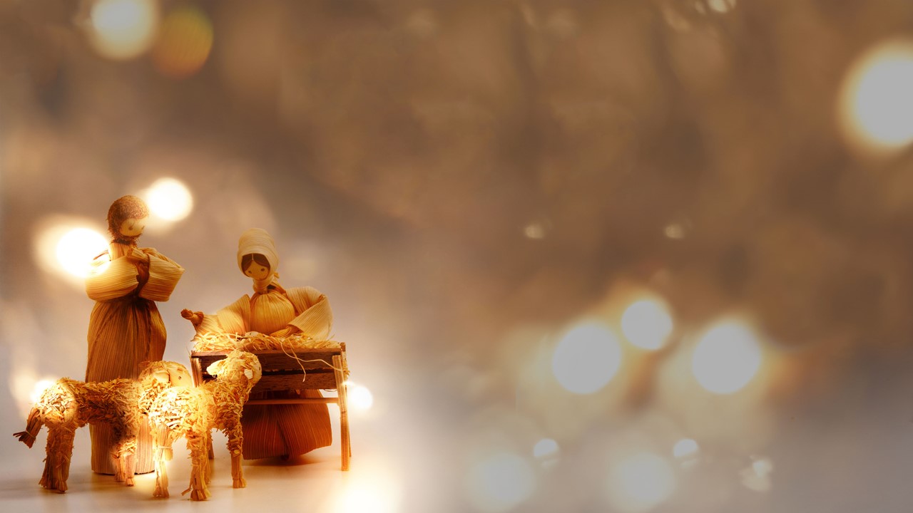 Stock image of a Nativity scene made with corn husk dolls, with the words "Join Us For" displayed
