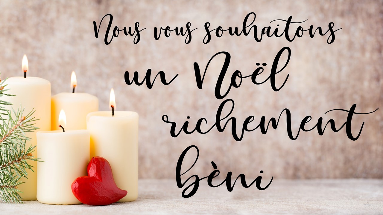 Stock photo of Christmas candles with the words "Celebrate with us the birth of Jesus Christ" displayed