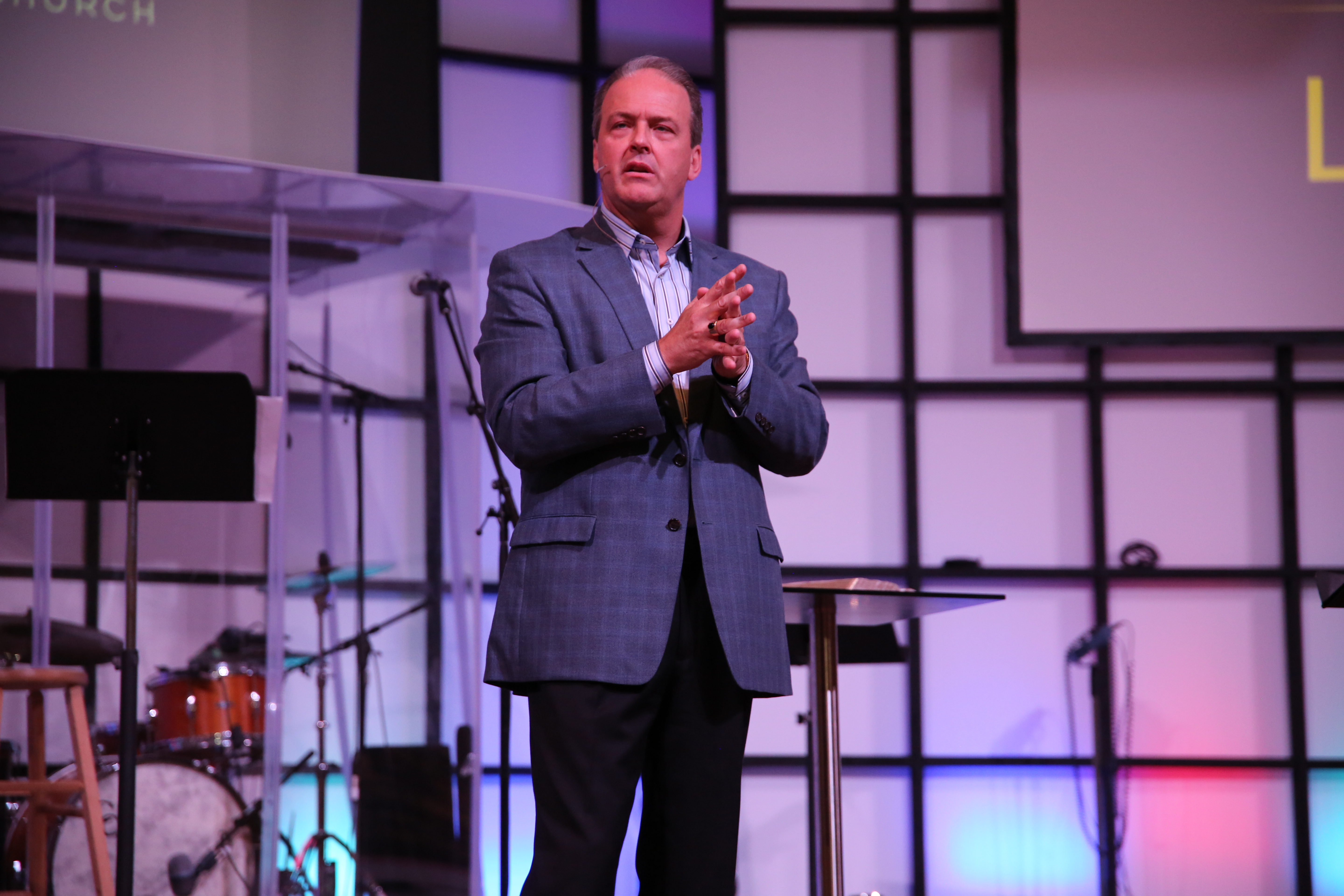 Photo of Craig Burton speaking on stage.