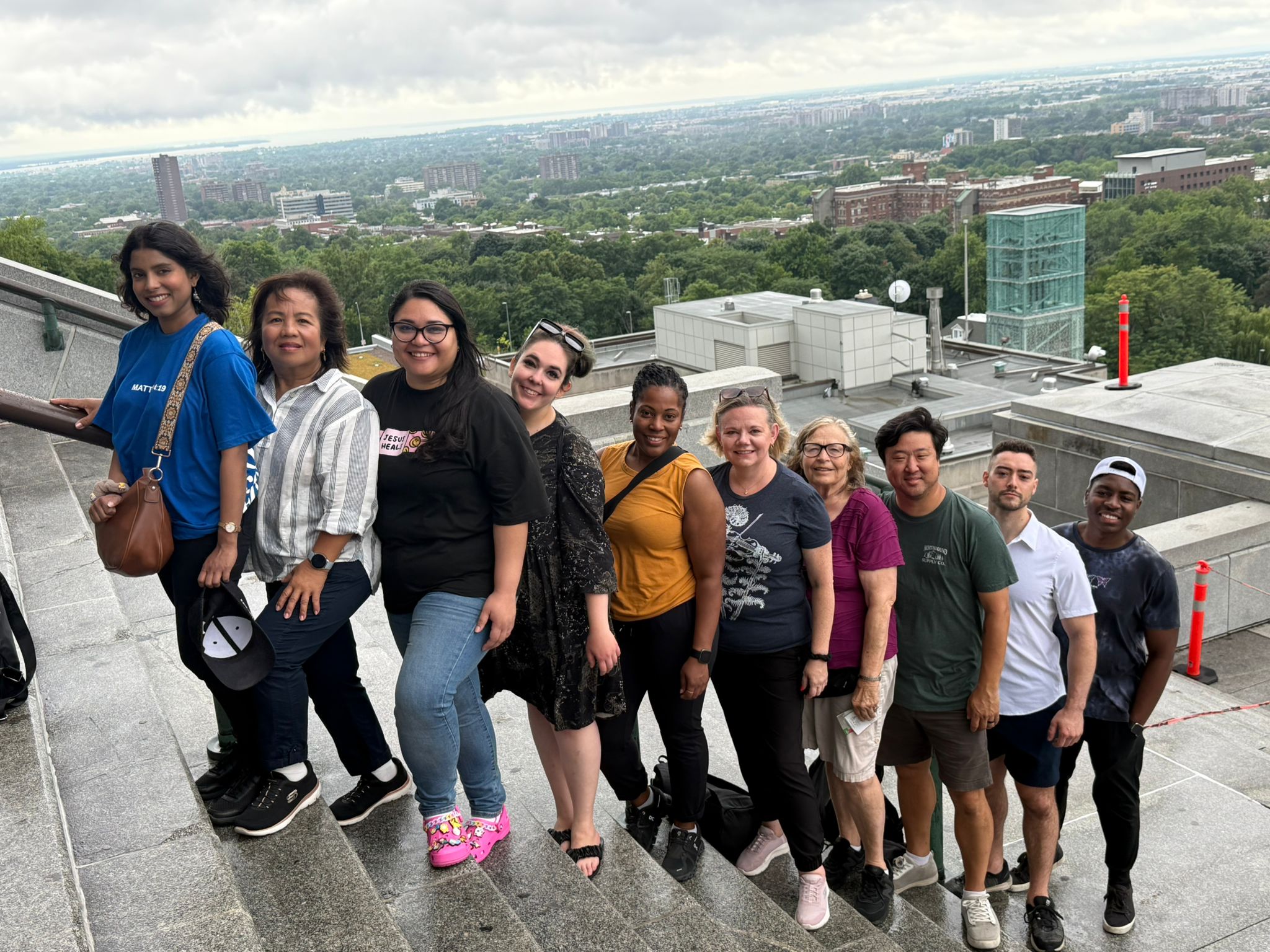 A group of people on steps.